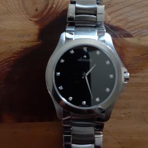 Men's movado diamond  dial watch